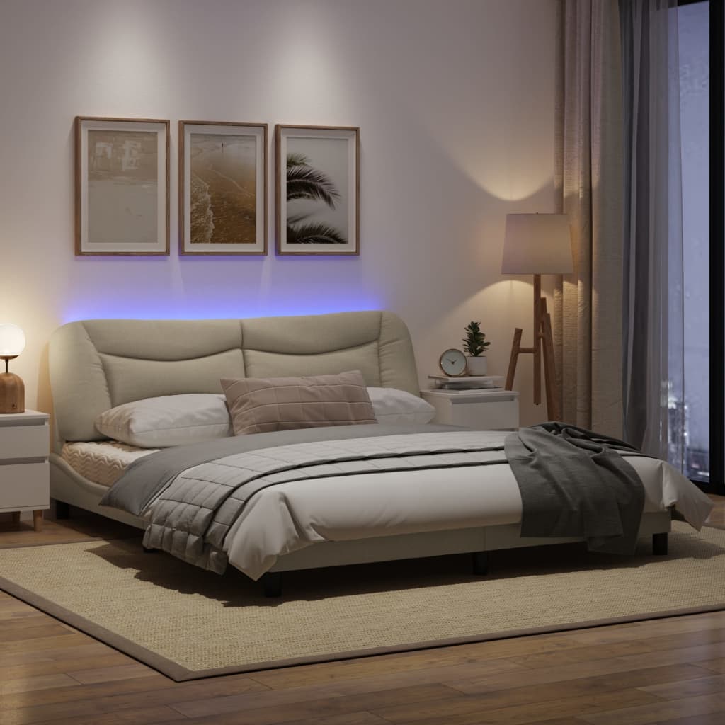 Estrutura de cama com luzes LED 180x200 cm tecido creme