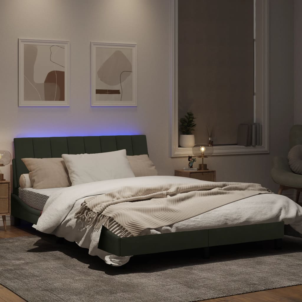 Estrutura de cama c/ luzes LED 140x190 cm veludo cinzento-claro